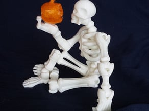 Printable Skeleton with a Little Pumpkin