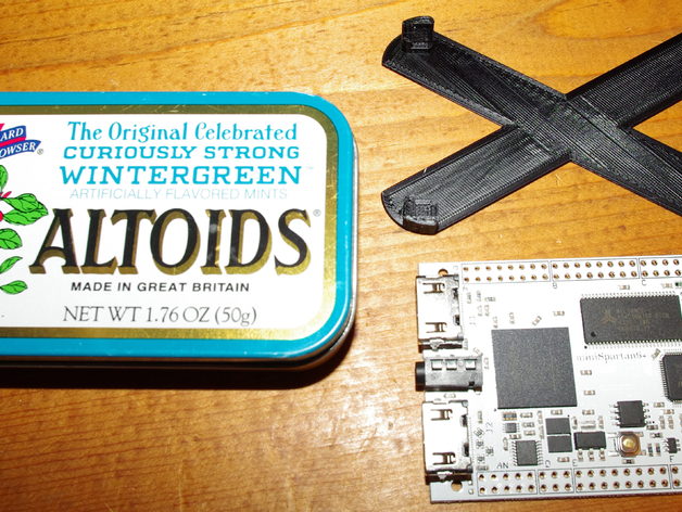 standoff bracket for holding a Mini Spartan 6 FPGA board in an Altoids tin