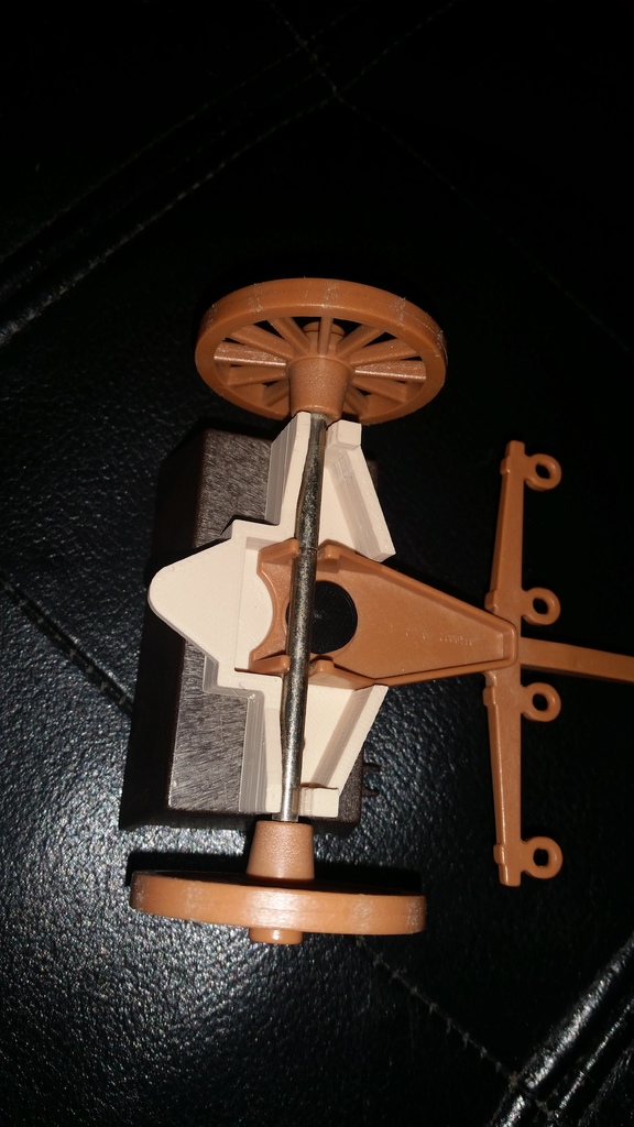 Playmobil 1980s axle assembly for stage coach, wagon and limber.