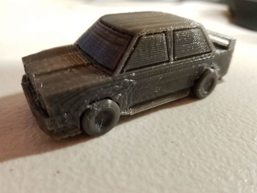 Low poly rally car with print in place wheels