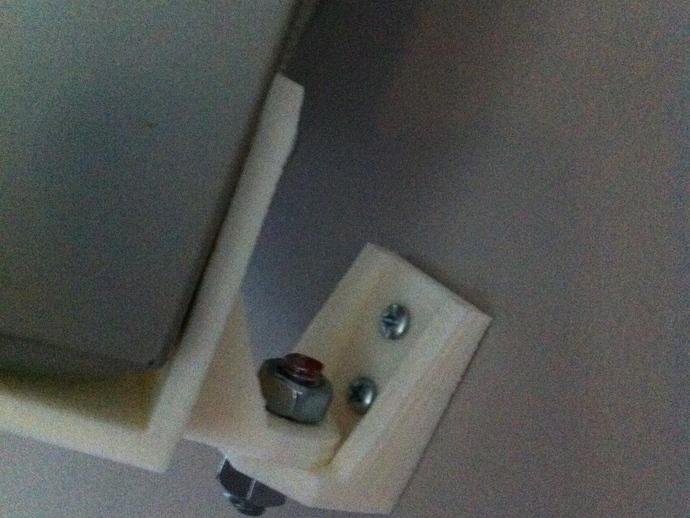 Wall mount for a Sony home theater speaker.