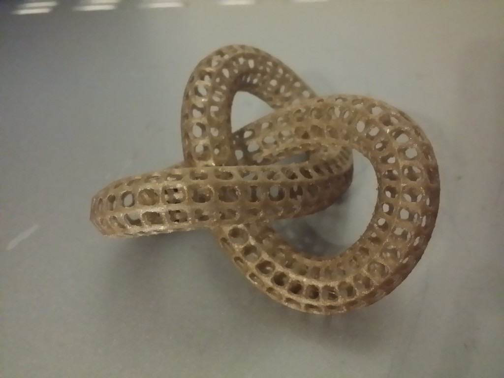 Torus Knot Cage and Balls