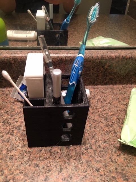 Toothbrush and Floss Holder