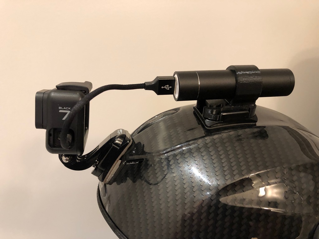 Helmet Charger Battery Holder for GoPro mounts.