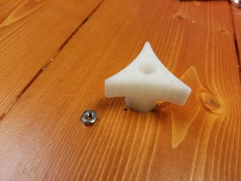Triangular thumb screw knob w/ #8 Nut Holder