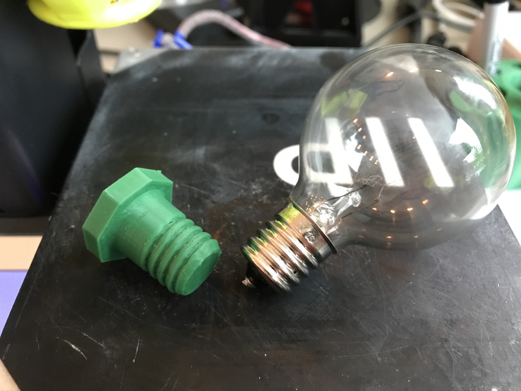 Screw-in lightbulb socket filler blank for E17/C9 base