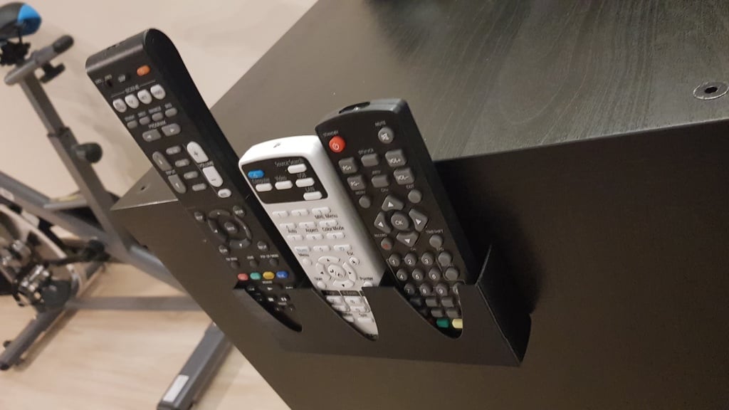 Three remote controls holder