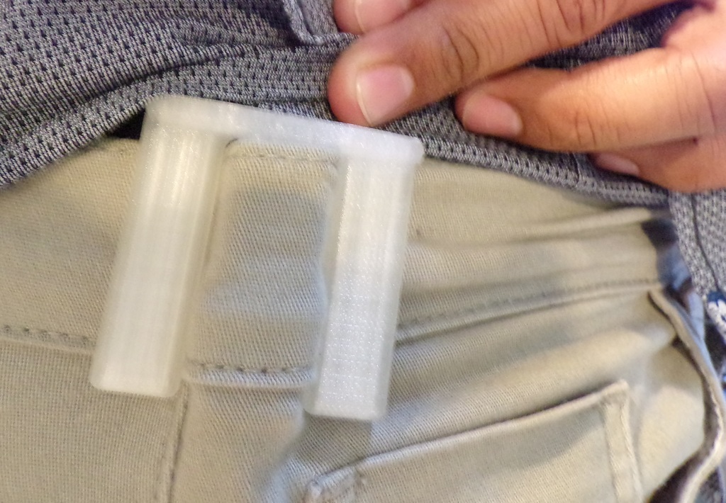 CLOTHING ADJUSTER FOR PANTS