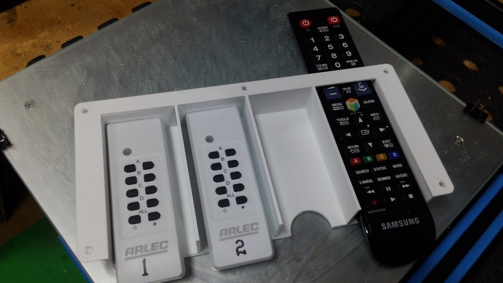Under-shelf remote holder