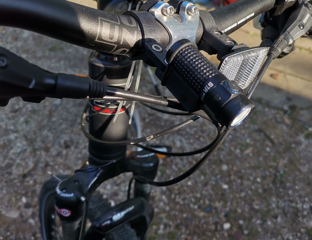 Multifunctional flashlight / torch holder for bicycle esp. Olight S1R Baton II; S1 Baton mini; Thrunite Ti3