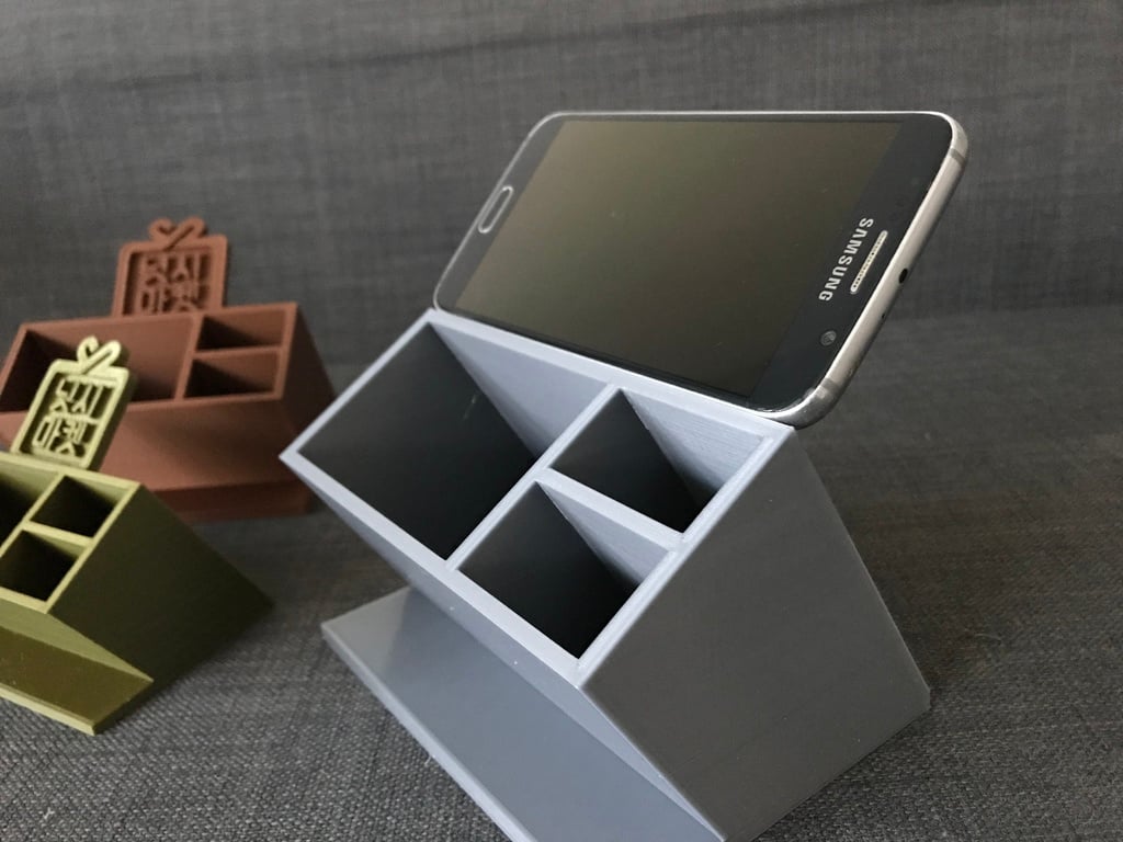 Pencil Holder with Company logo, Phone Holder, Snack Box? :)
