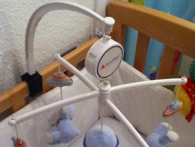 Cradle support for rotating toy
