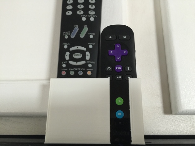 Parametric remote holder for Sharp TV remote and Roku remote.