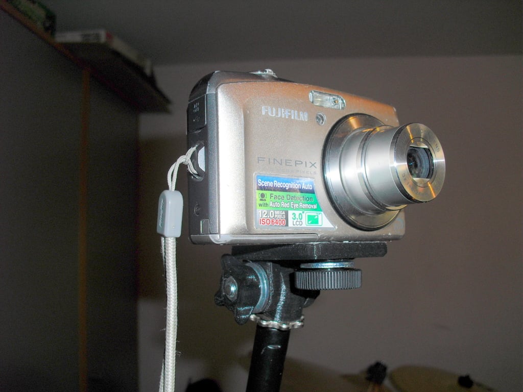 Camera holder on microphone stand