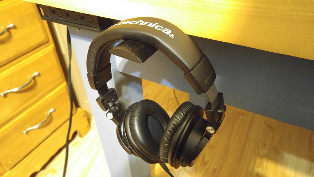 Under-desk headphone hanger
