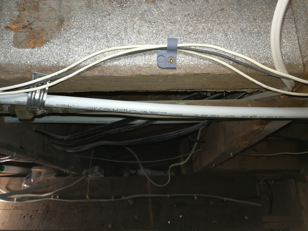 Bendable hose and wire holder