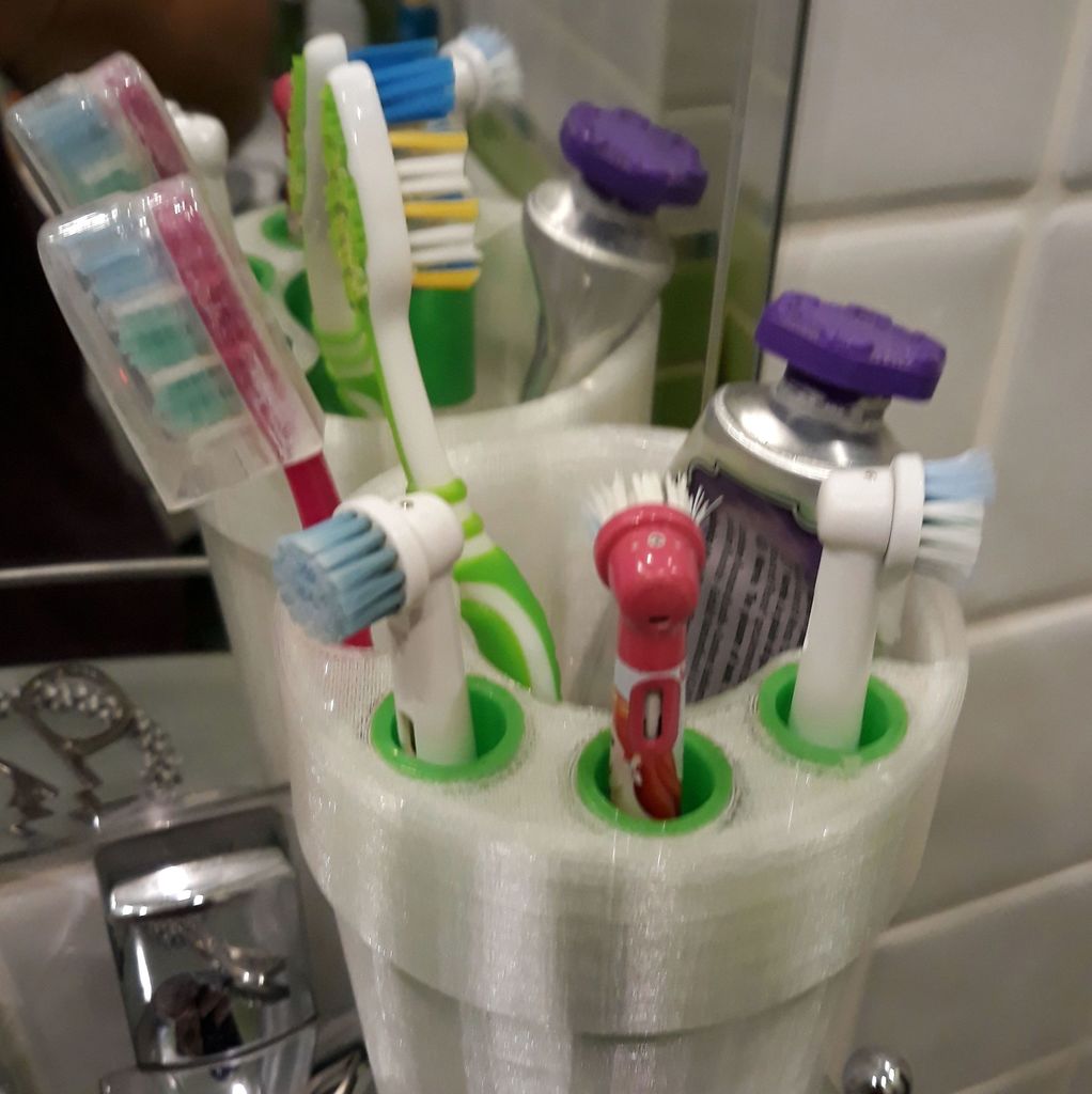 Bathroom glass with toothbrush holder