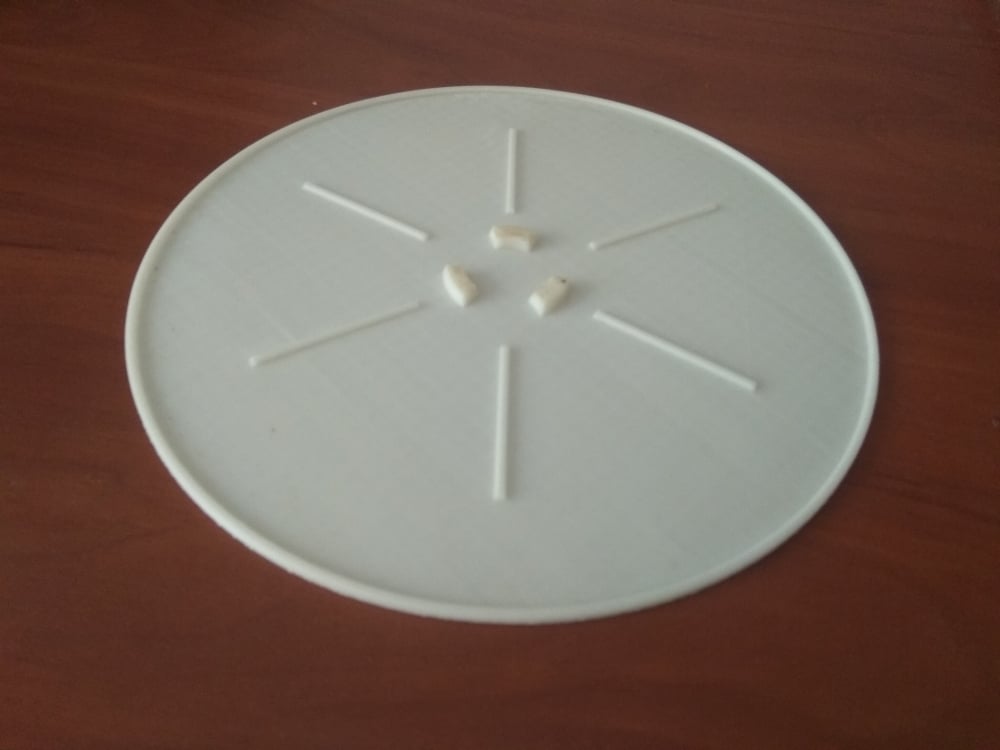 Microwave oven rotating plate