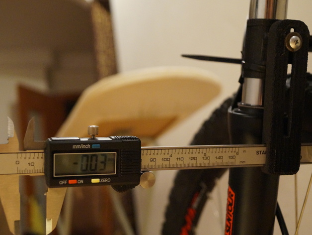 Caliper bracket, bicycle wheel calibration