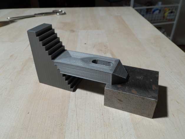 Clamp for T-nut bed with step block