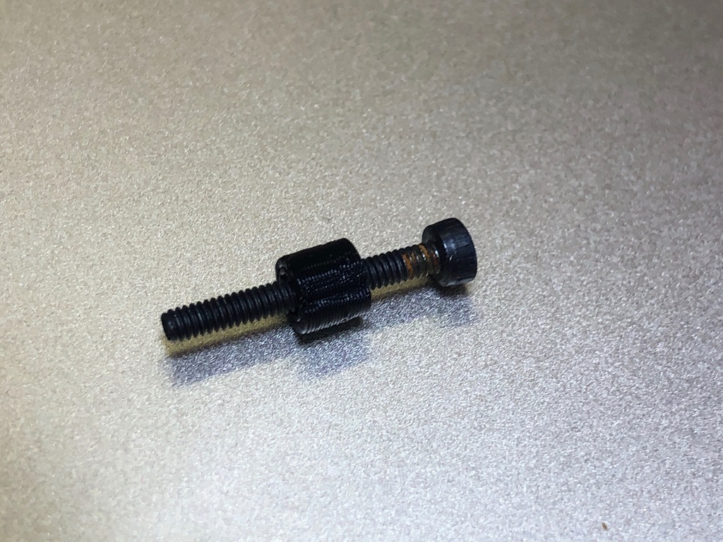 M2 Spacer (4mm tall spacer for 2mm bolt) Smallest thing on Thingiverse!