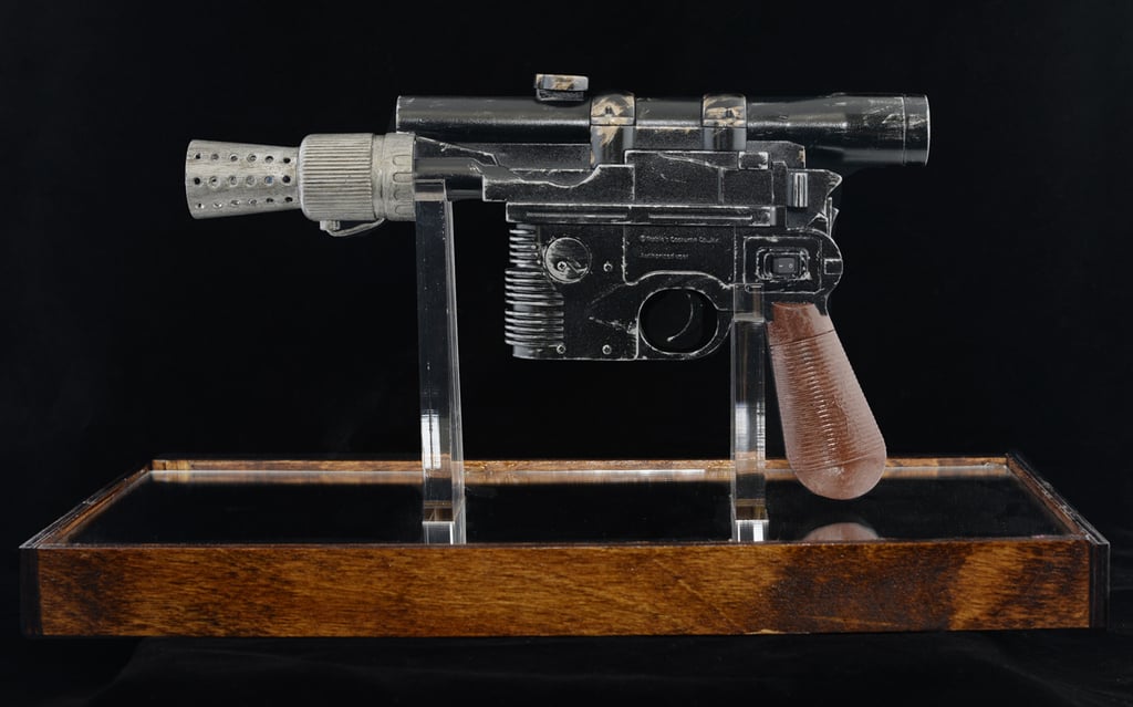 Display stand for toy Han Solo DL-44 blaster