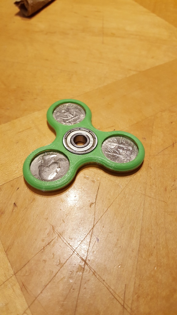 Fixed captured quarter fidget spinner