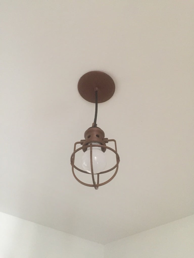 Industrial hanging cage lamp