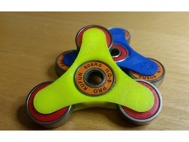Open wheel four bearing fidget spinner