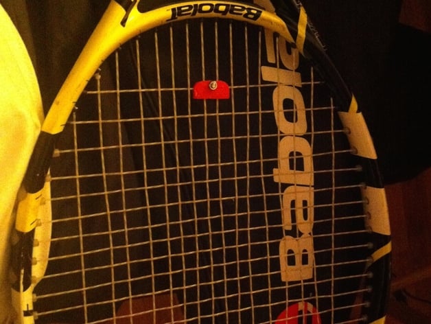 Tennis Racket Vibration Dampener (using a pencil-end eraser)