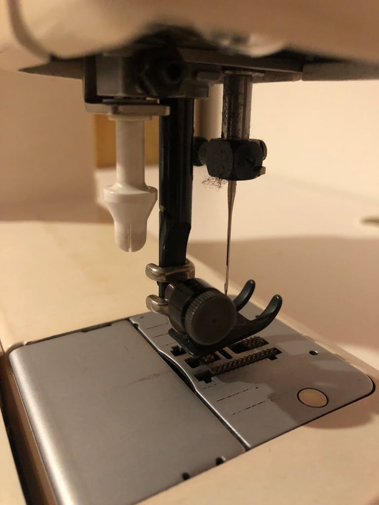 Elna sewing machine bobbin extractor