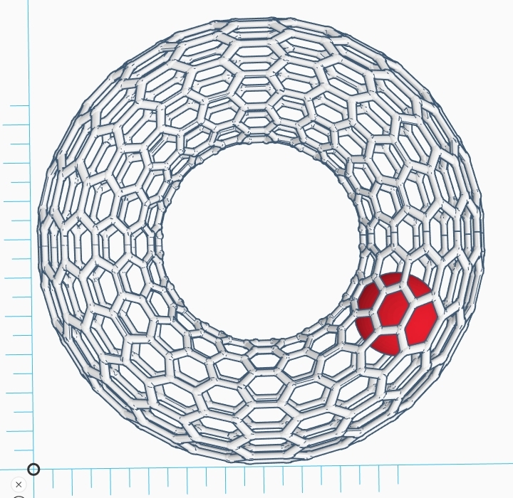 a ball revolves in a carbon nano tube donut model toy (10cmX10cmX3cm)