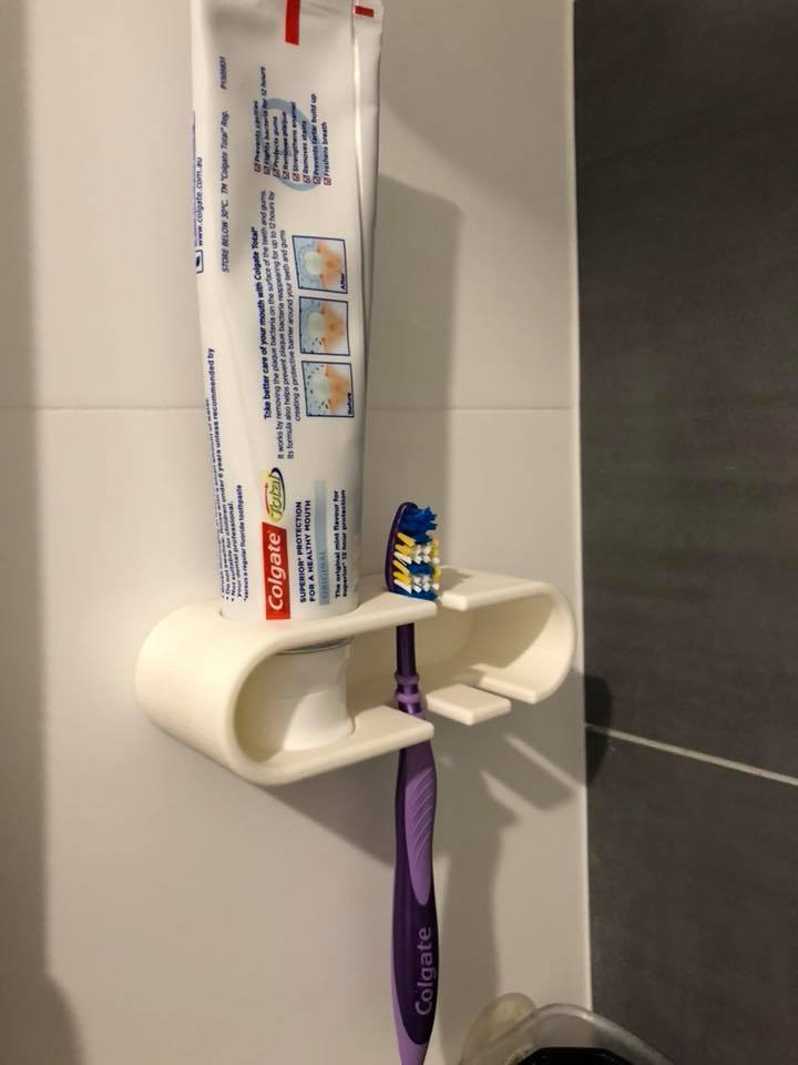Toothpaste and toothbrush holder