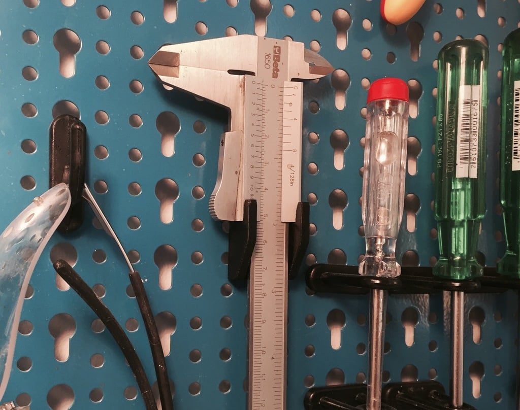 Caliper bracket - tool wall