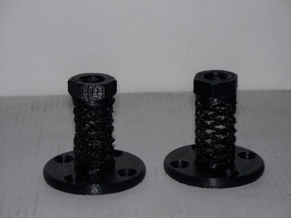 Double spring vibration dampening threaded mounting flange for flexible filament.