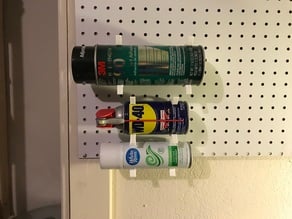 Horizontal can clip for pegboard