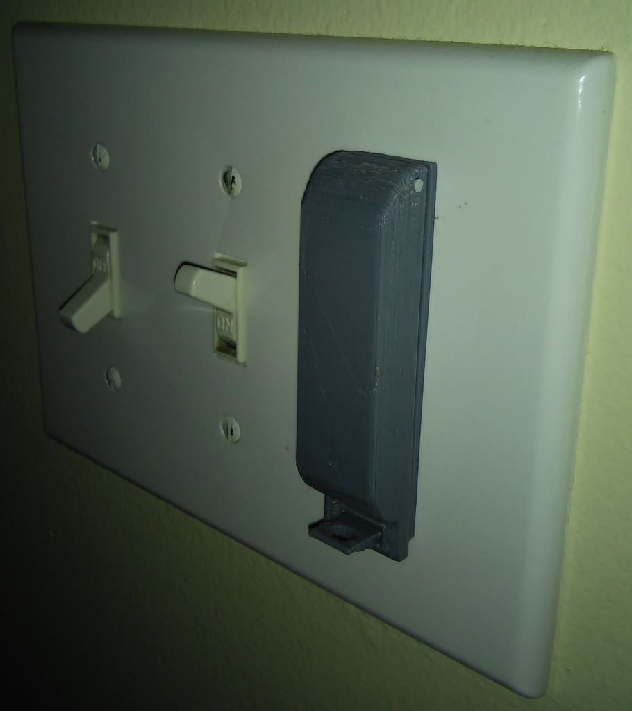 Lockable light switch guard
