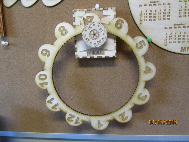 Laser cut gear O'clock with a redesigned hour wheel.