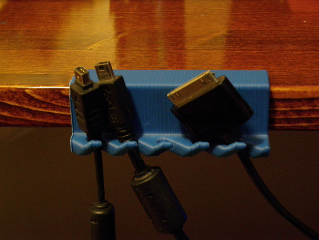 Clamp-on desk USB cable holder