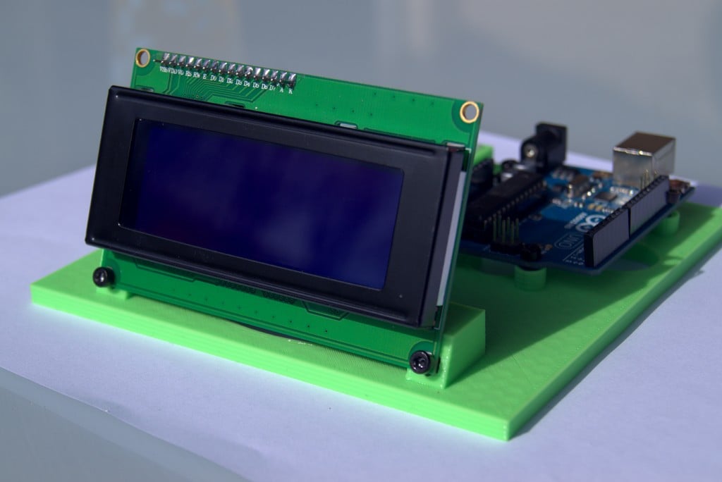 Arduino, breadboard and LCD screen holding