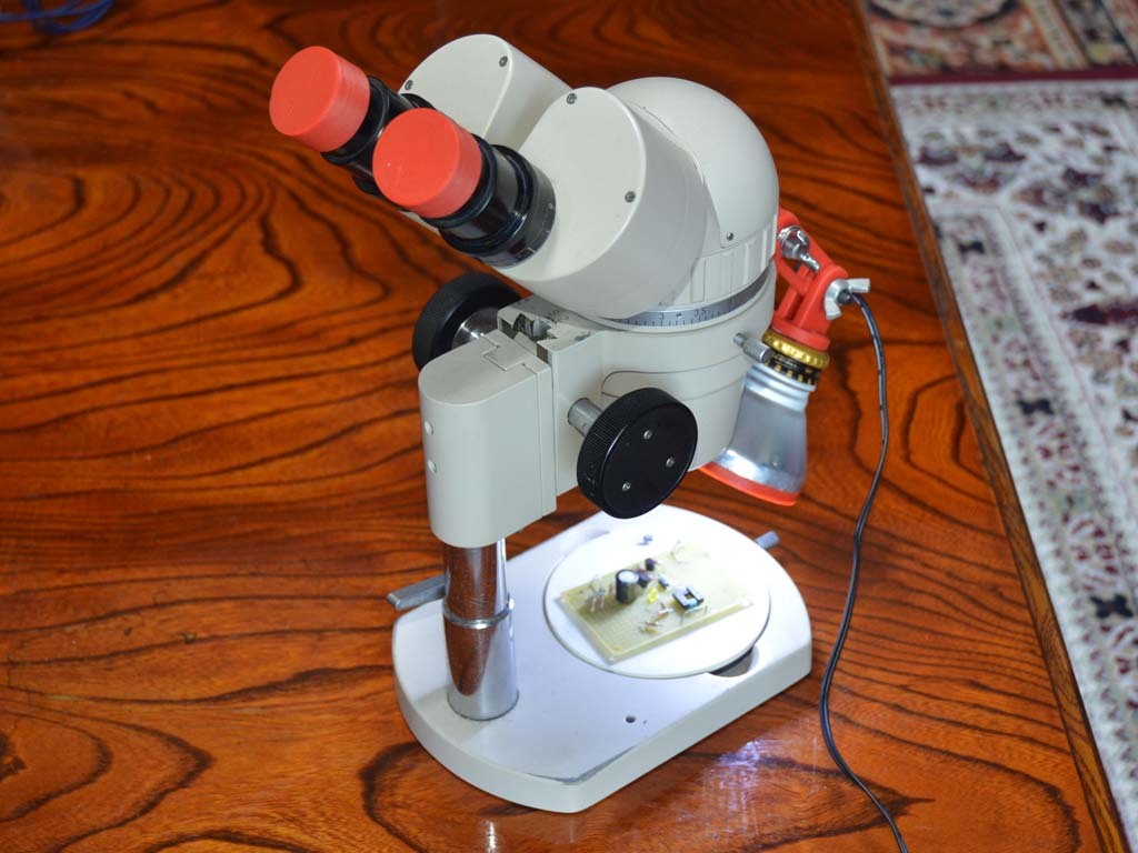 Cap for stereo microscope