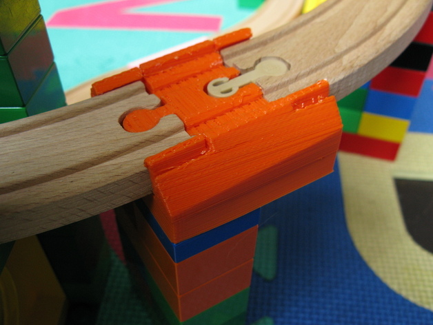 Angled Duplo Brick to Brio Track adapter with snap-lock