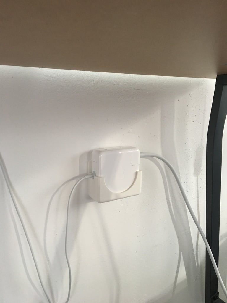 MacBook Pro power adapter wall mounting holder
