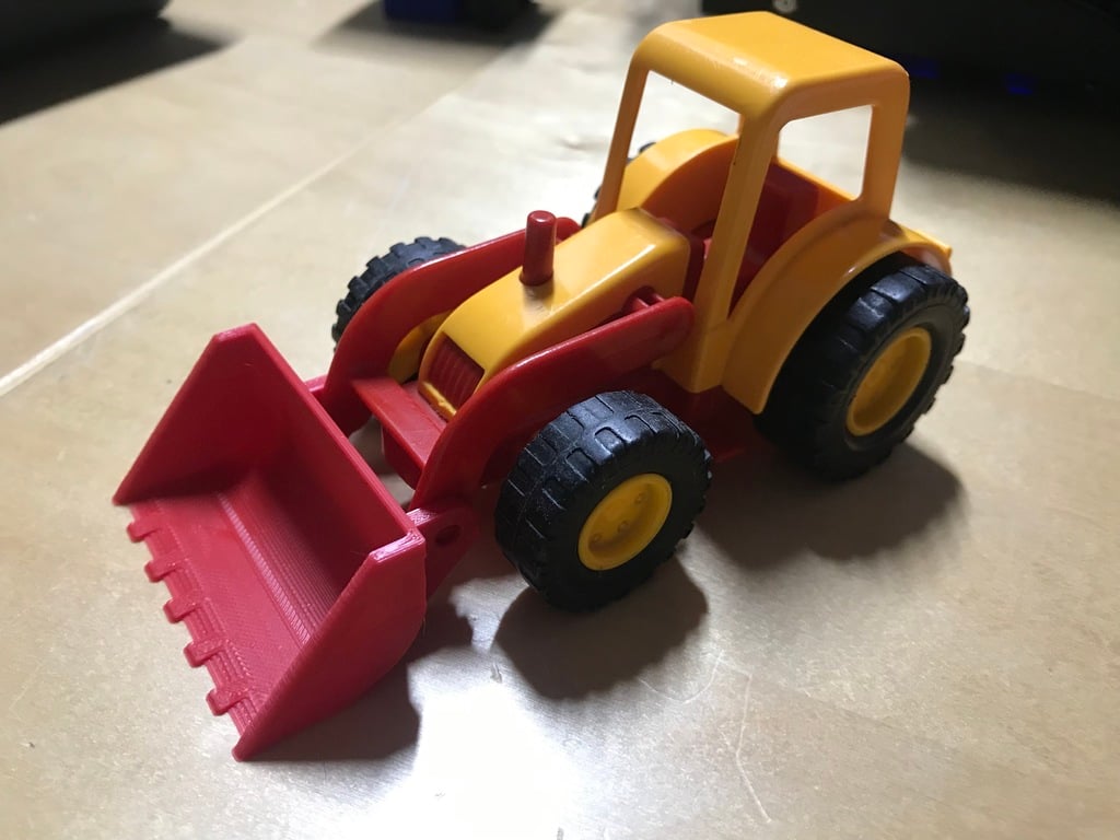 Front bucket for toy tractor