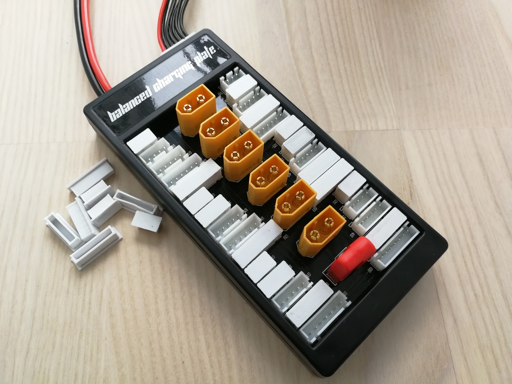 Balanced/parallel charging plate plug covers