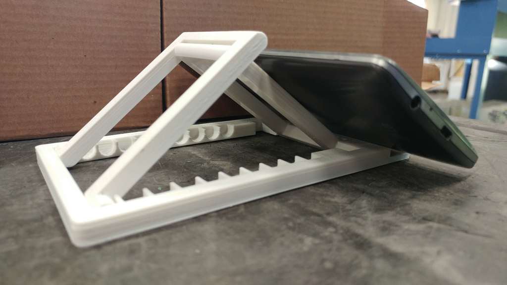 Bigger Universe Folding Cell Phone and Tablet Stand - Great for Airplanes