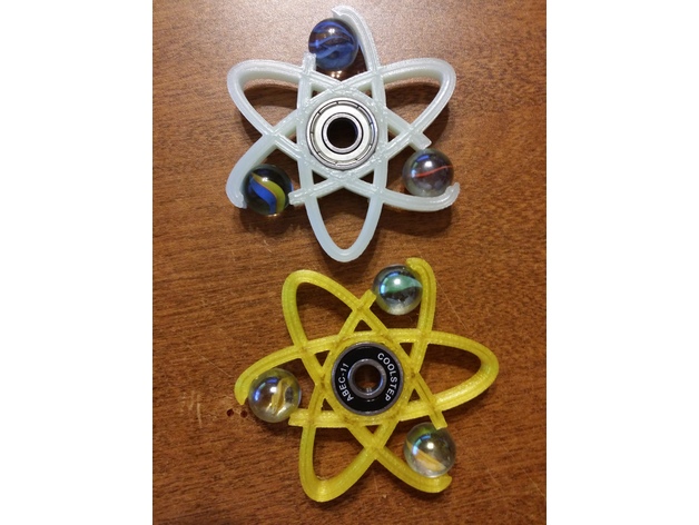 Atom and Curved Marble Spinner