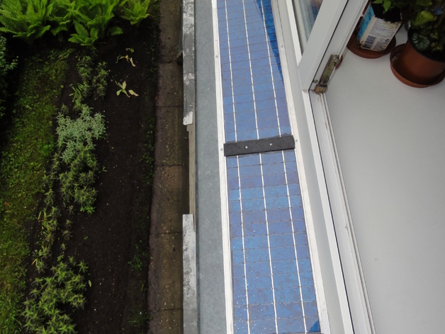 Window sill solar panel (urban environment)