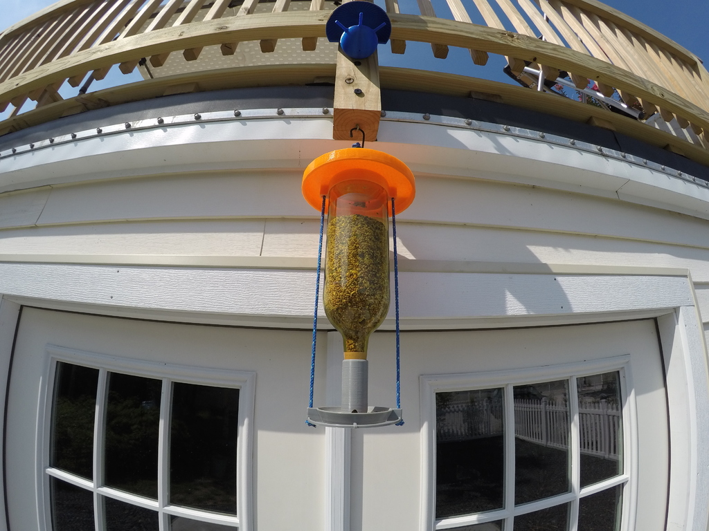 Wine bottle bird feeder