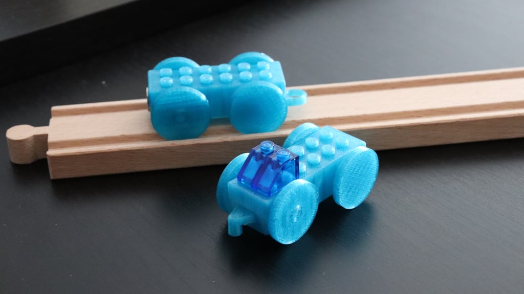 Lego train on wooden rails